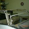 Convertible top frame with top removed, pads, cables